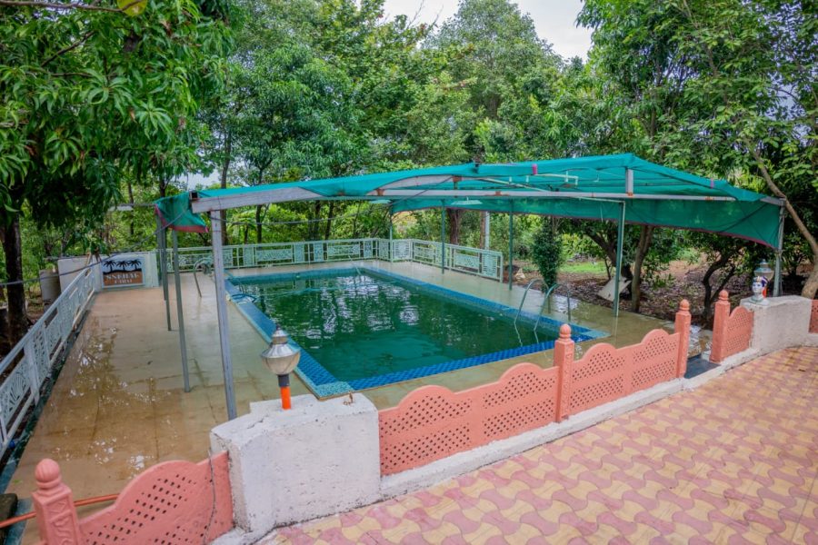 5 bhk Sw pool villa with 1 party hall in 2 acre farm house